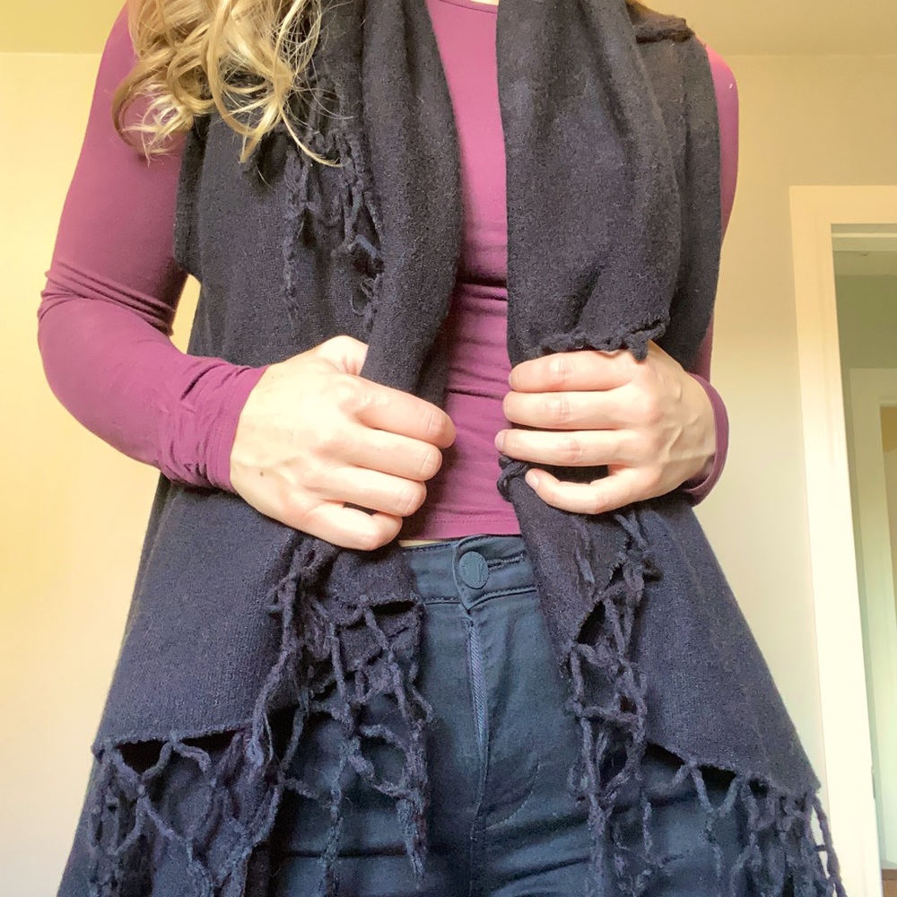 Sleeveless black flowy vest